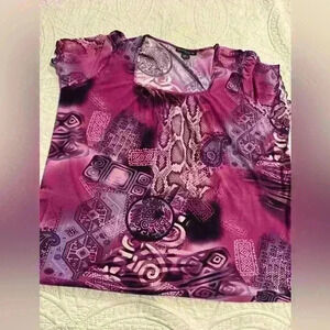 Women’s Blouse by Styles for the City it’s pink and black. Size 2X